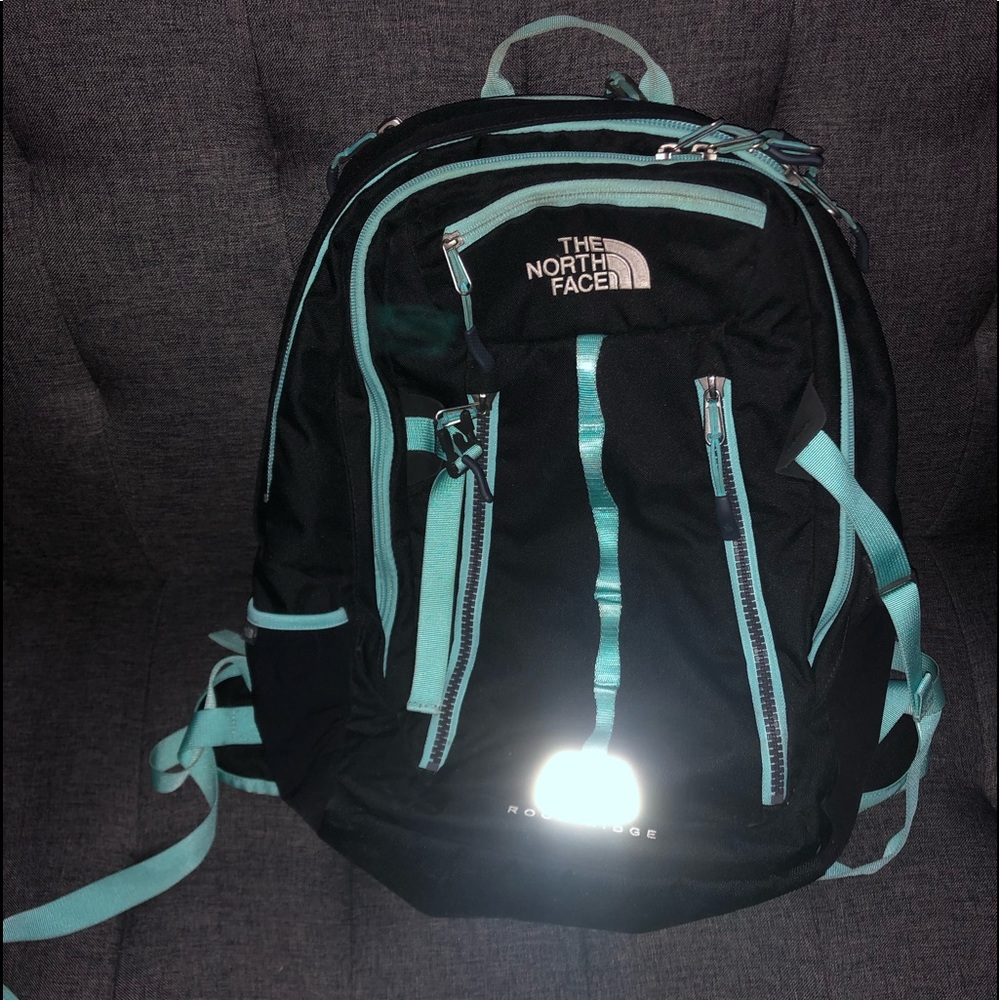Light Blue/Black North Face backpack
